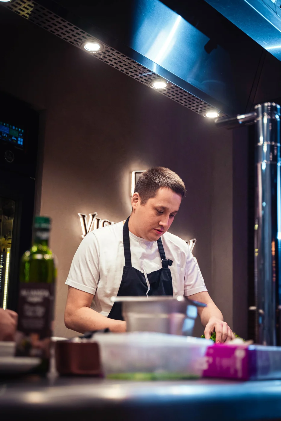 A chef preparing food, illustrative photography